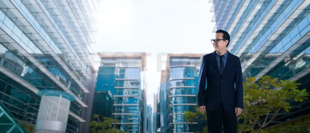 
Businessman happy walking in business center