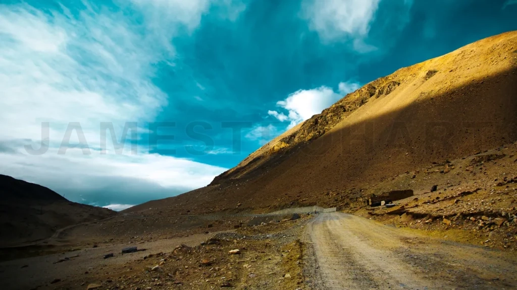 
Stunningly Beautiful Mountain Road Through The Western Tibet With Blue And White Clouds Sky