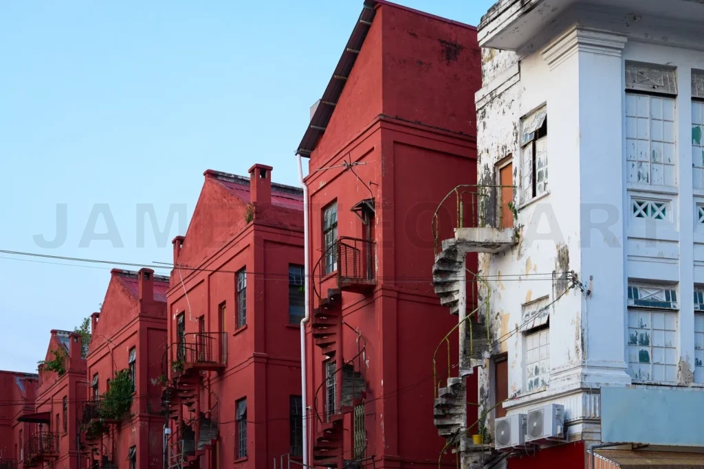 
Old red buildings with spiral staircases in ipoh, malaysia