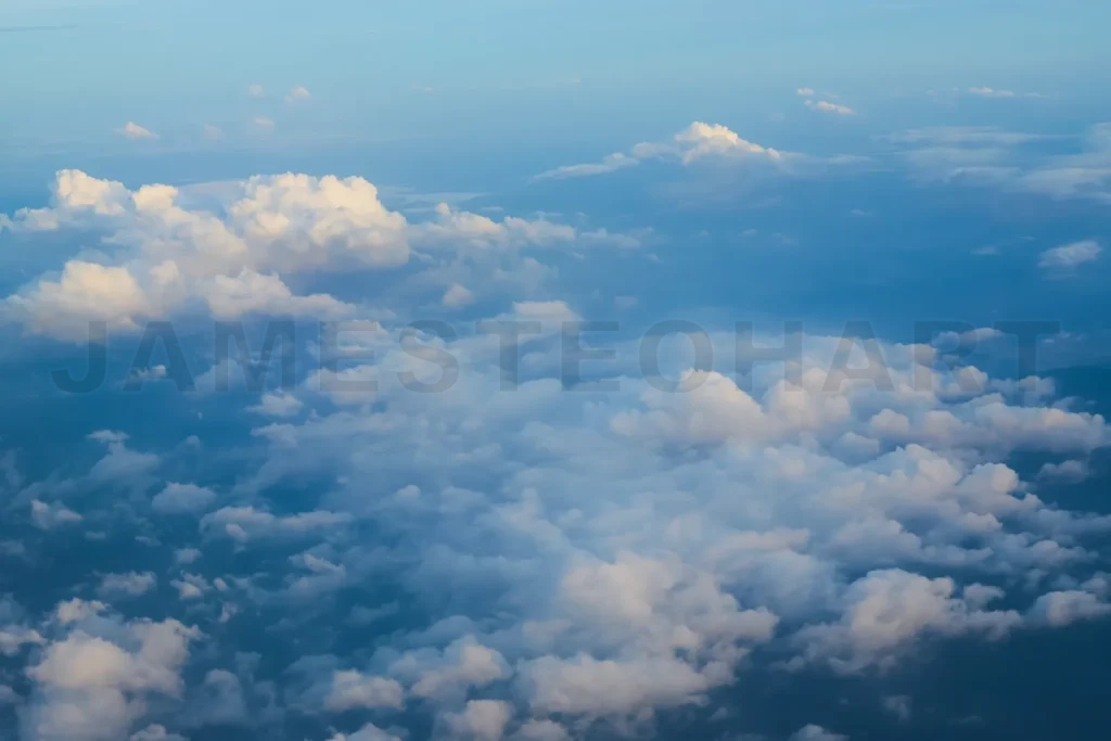 
Beautiful blue sky with fluffy clouds creating a dreamlike atmos