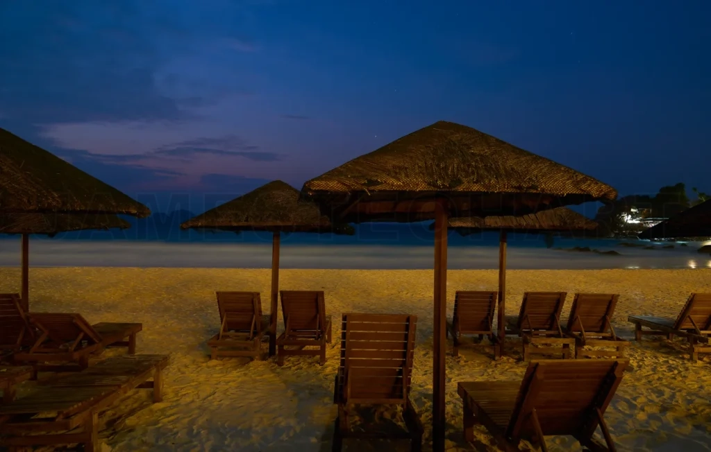 
Empty beach with sunbeds and umbrellas waiting for tourists at n