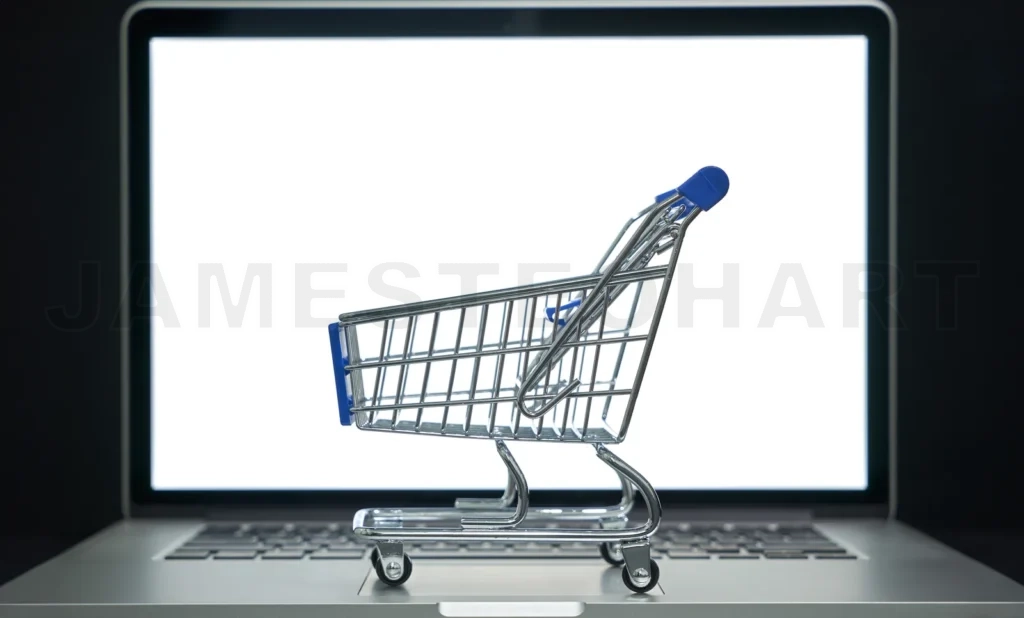 
Mini shopping cart on laptop for online shopping concept