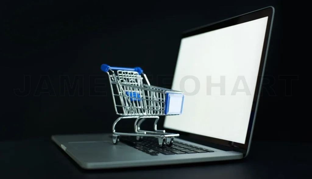 
Online shopping concept with laptop and cart