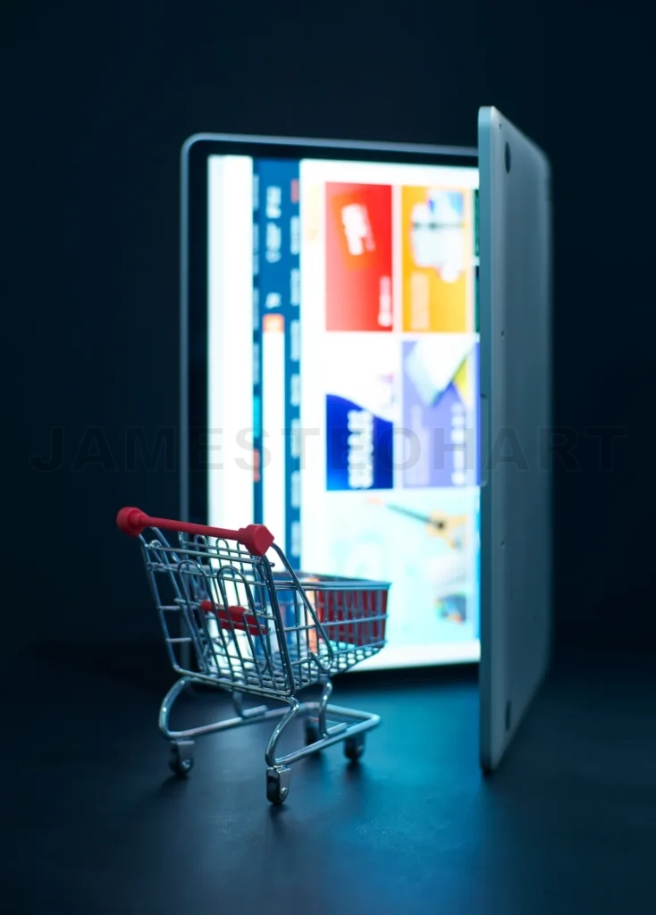 
Shopping Cart Or Trolley In Front Of Laptop , Online Marketing And Business Trading Concept