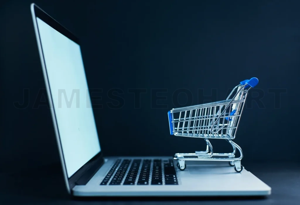 
Shopping Cart Or Trolley In Front Of Laptop , Online Marketing And Business Trading Concept