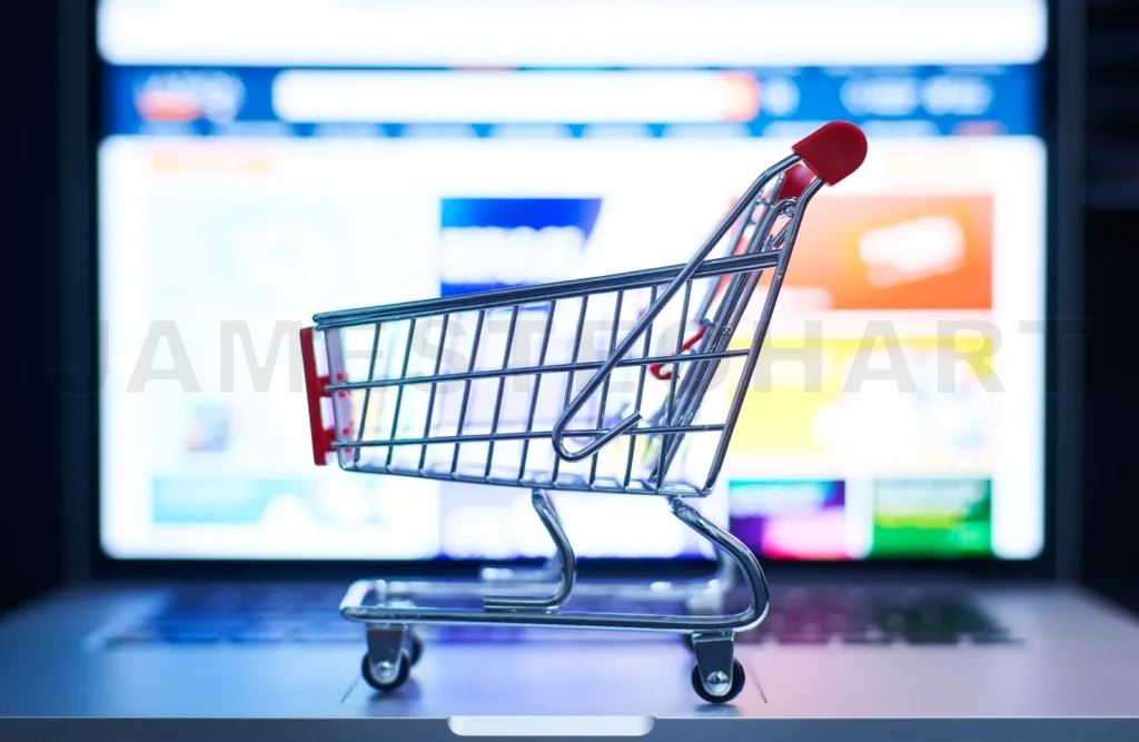 
Shopping Cart Or Trolley In Front Of Laptop , Online Marketing And Business Trading Concept