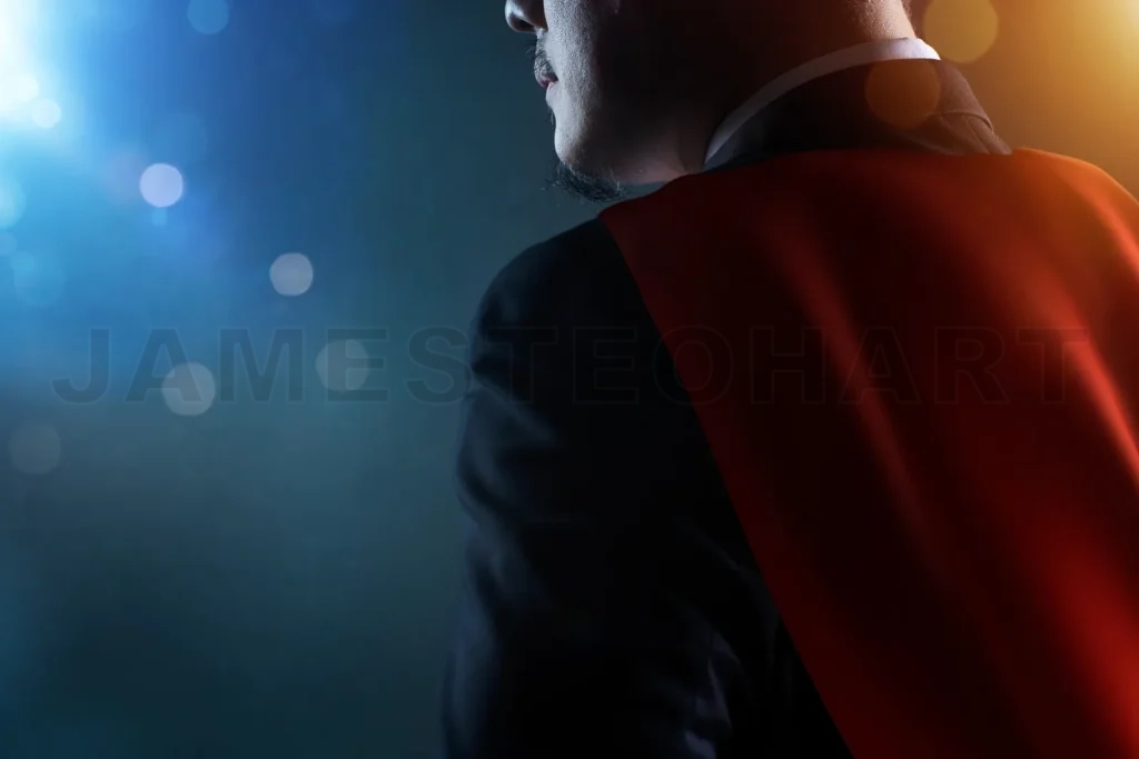 
Closeup Businessman In Suit And Cape Hero