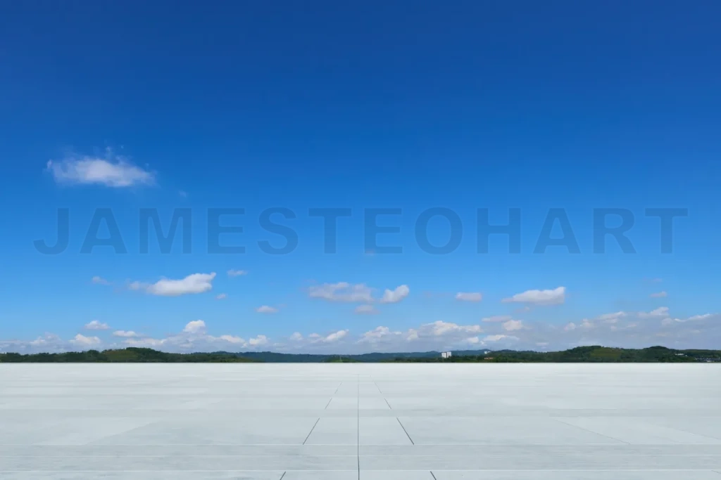 
Empty concrete floor and blue sky with scattered clouds creating a peaceful atmosphere