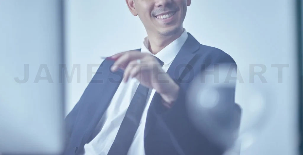 
Close up crop portrait shot of a smiling and confident young bus