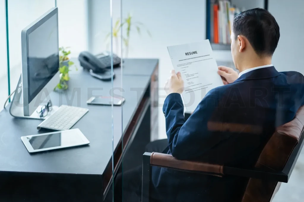 
Business Man Review His Resume On His Office,Seleted Focus