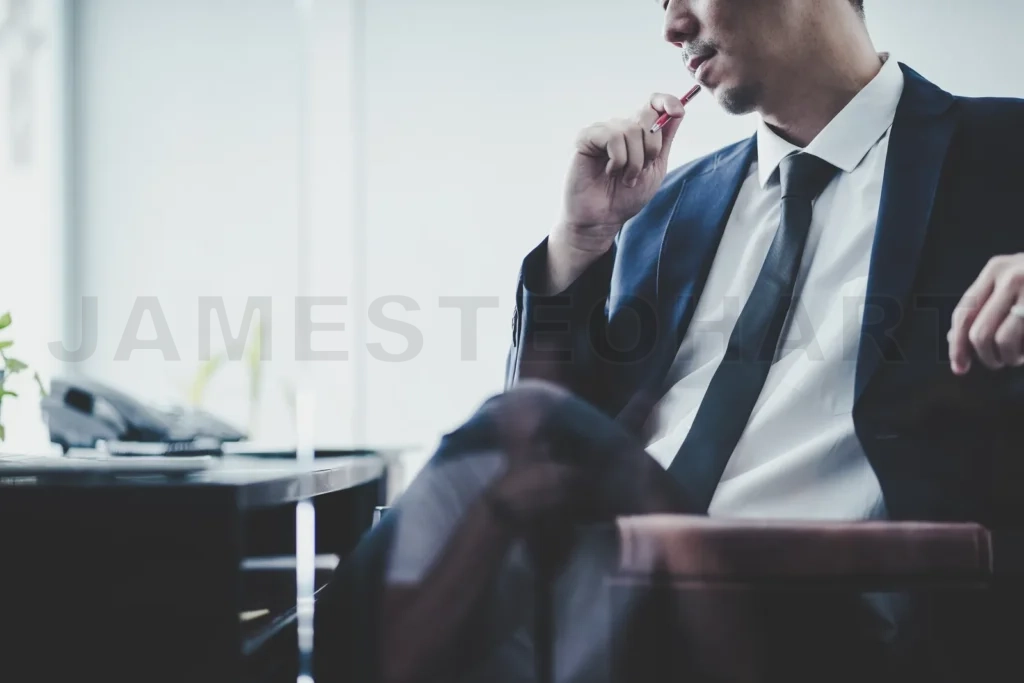 
Businessman Thinking Ideas Sitting At His Desk In A Office