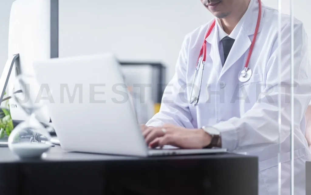 
Young Asian Doctor Sit And Hard Work With Computer