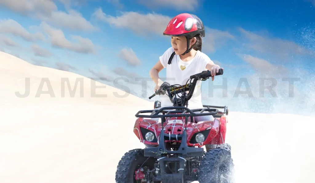 
Little Girl Riding Atv Quad Bike In Desert With Beautiful Blue And White Sky