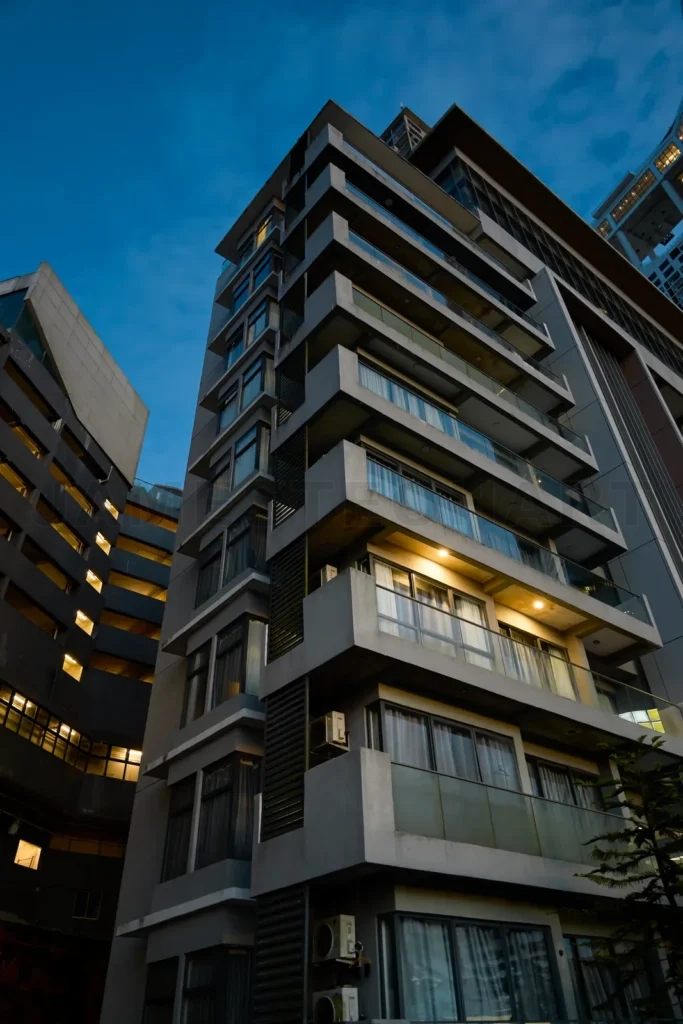 
Modern apartment building at dusk in genting highlands, malaysia