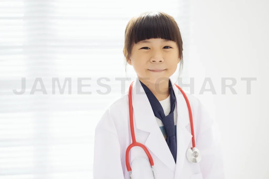 
Portrait Of Little Girl Dressed As A Doctor With A Stethoscope
