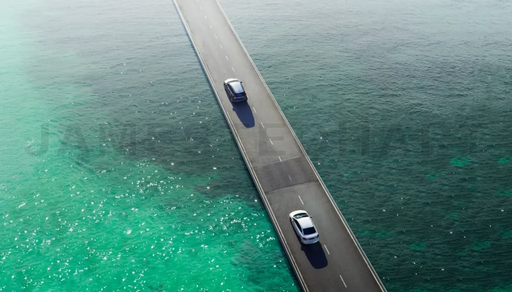 
Two Car Drive Pass On Flyover Bridge At Sea , Aerial View