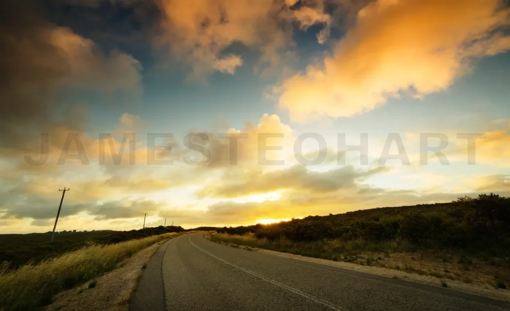 
Asphalt Road With Dramatic Sunset Sky