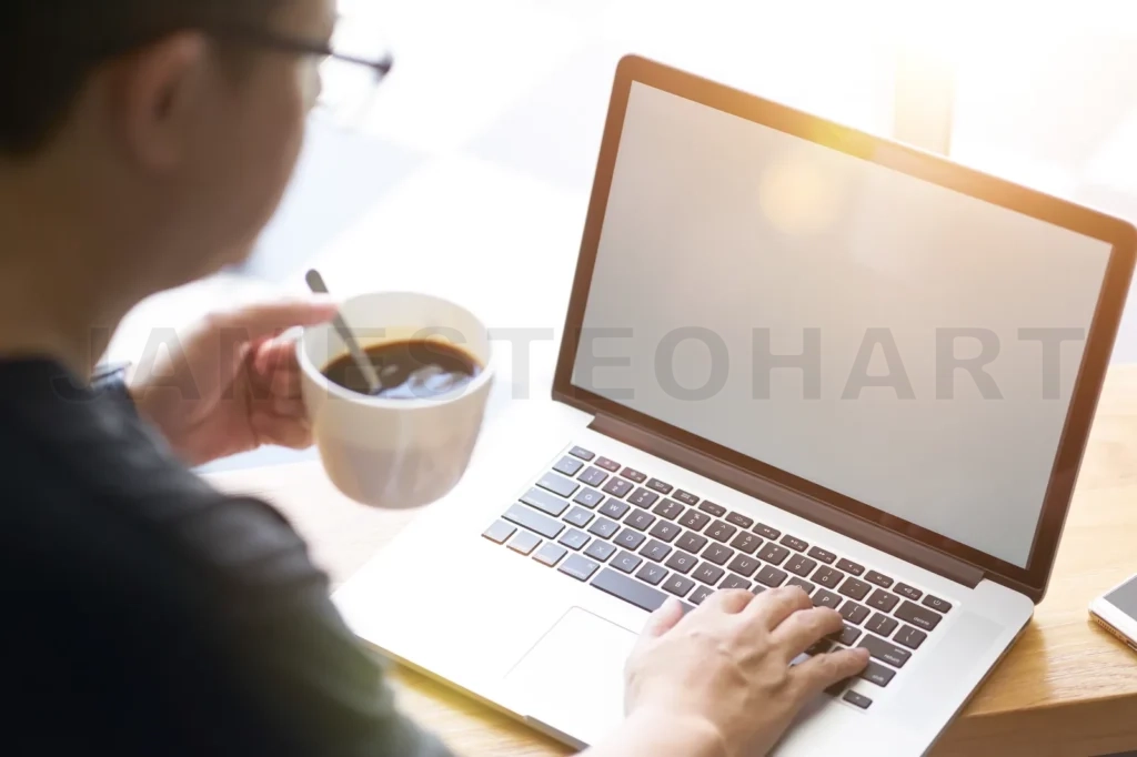 
Coffee In Businessman Hand With Laptop