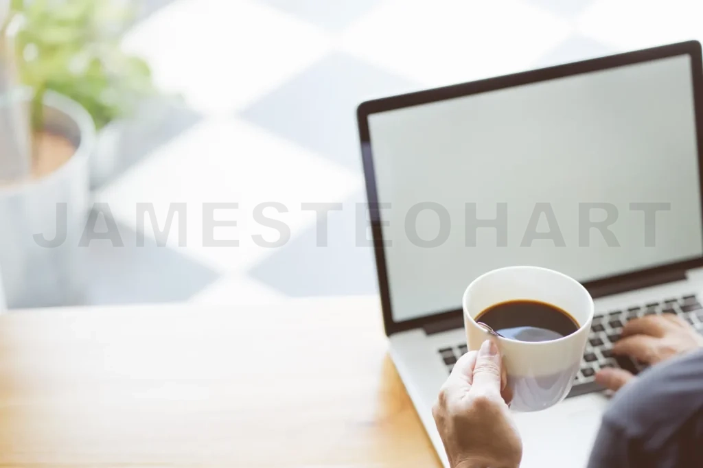 
Coffee In Businessman Hand With Laptop