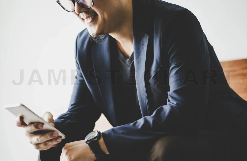 
Closeup Of Businessman Using Smartphone