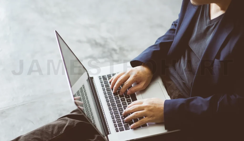 
Top Angle And Closeup View  Of Businessman Using The Laptop