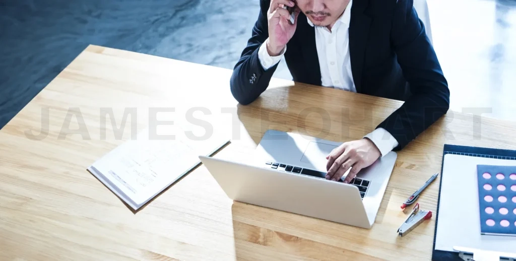 
Young businessman sitting in office