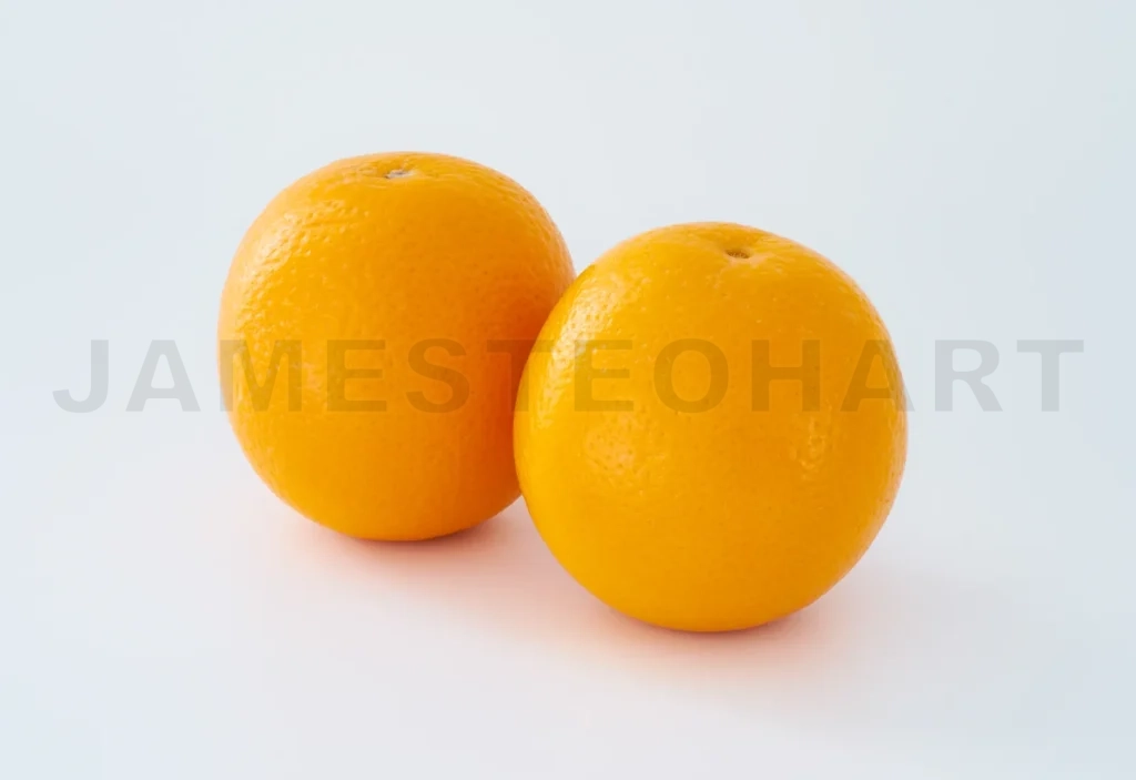 
Two Juicy Orange Fruit Isolated On White Background