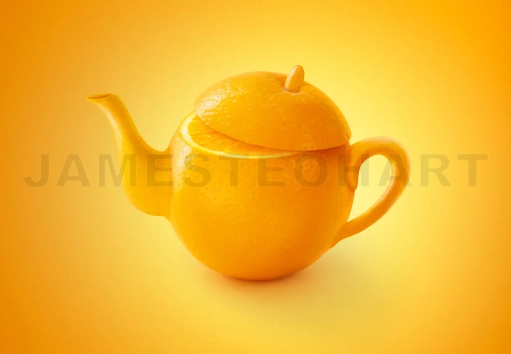 
Teapot Of Orange Fruit Isolated On Orange Color Background
