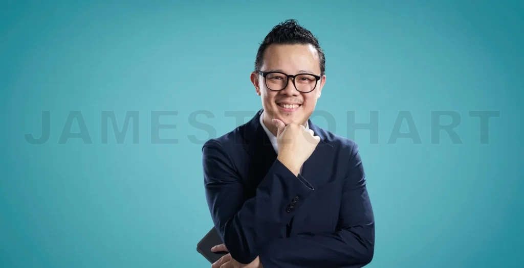 
Confident businessman smiling against blue background