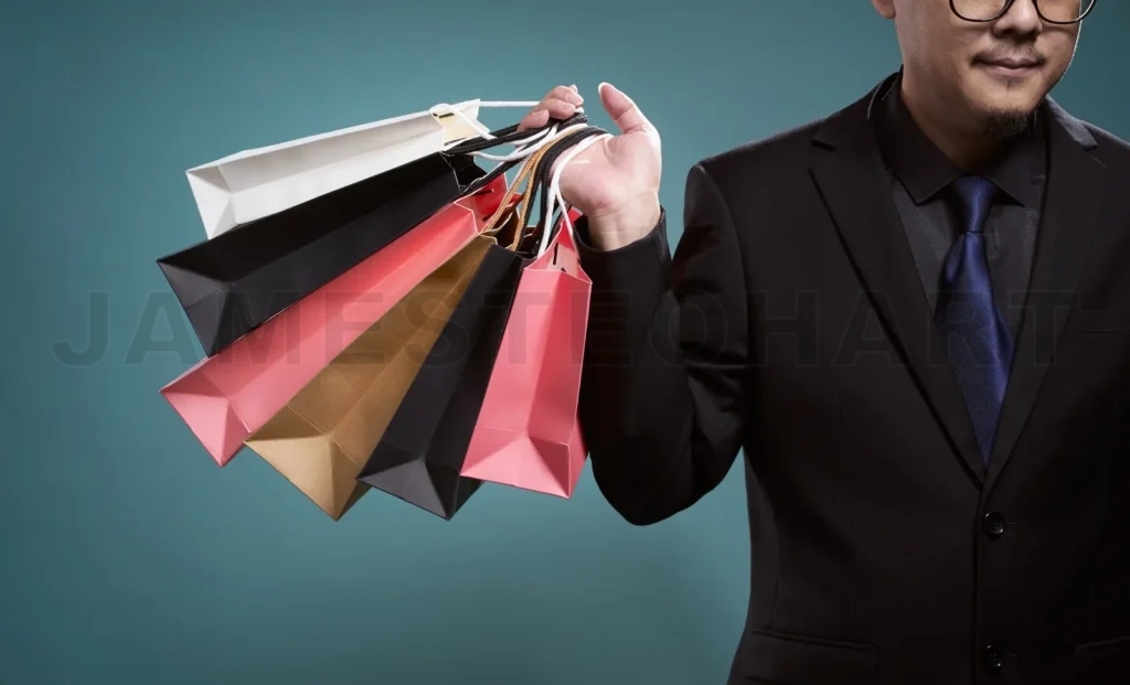 
Close Up Of Man With Shopping Bags , Isolated On Light Blue Background