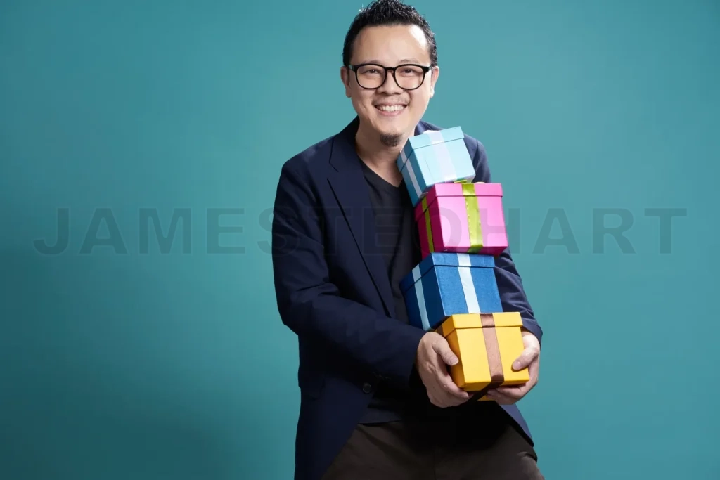 
Businessman Hold The Present Box To Give Somebody , Holiday And Christmas Gift Concept