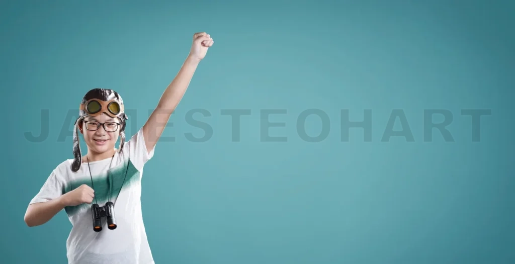 
Little Asian Boy Wear Aviator Glasses Enjoy Her Travel And Adventure Dreams , Isolated On Light Blue Horizontal Format Background