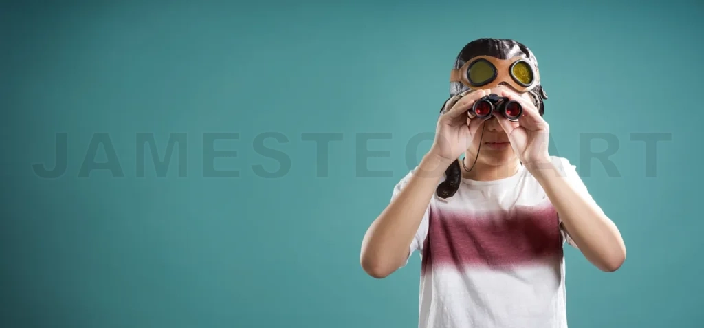 
Smart kid using binoculars