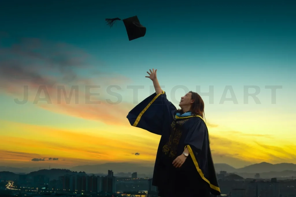 
Graduate celebrating success at sunset