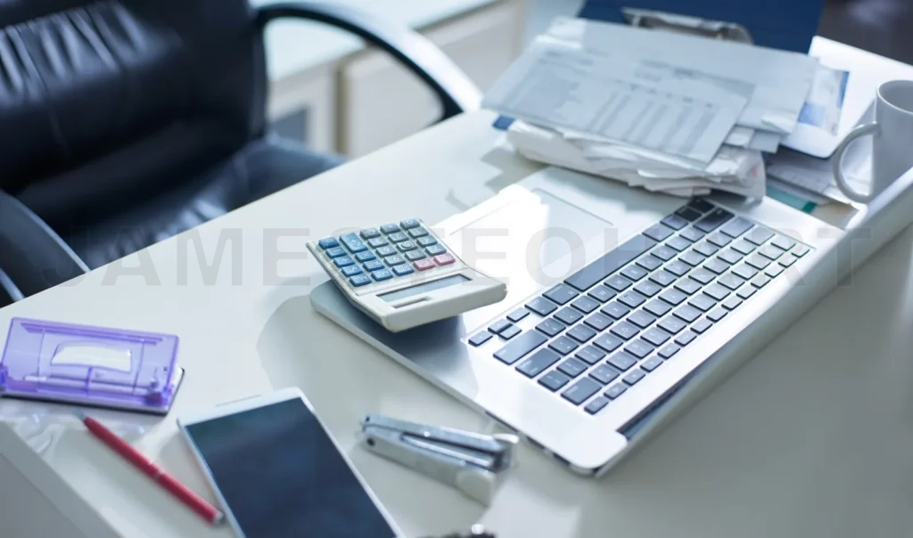 
Modern office desk with electronics and supplies