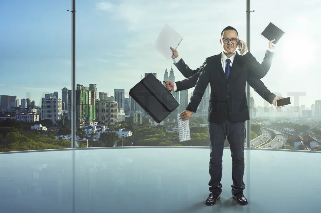 
The Businessman Has A Lot Of Hands To Complete His Work, A Powerful Businessman Concept