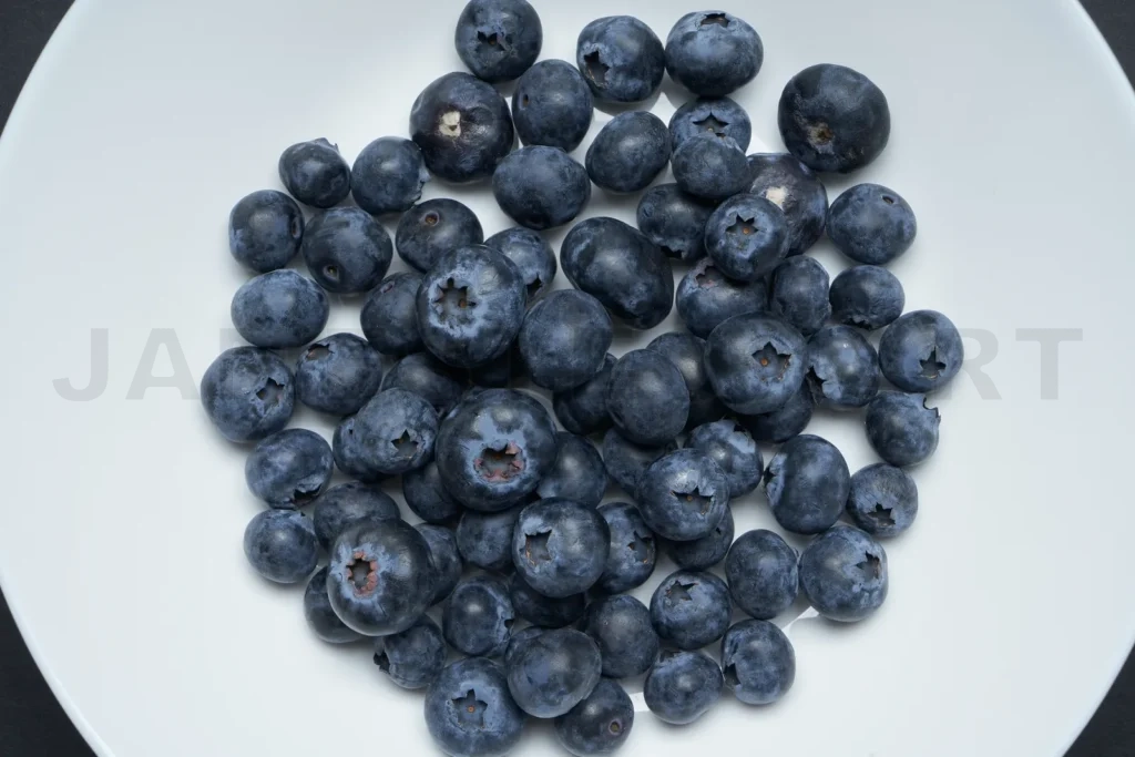 
Fresh organic blueberries in white bowl for health
