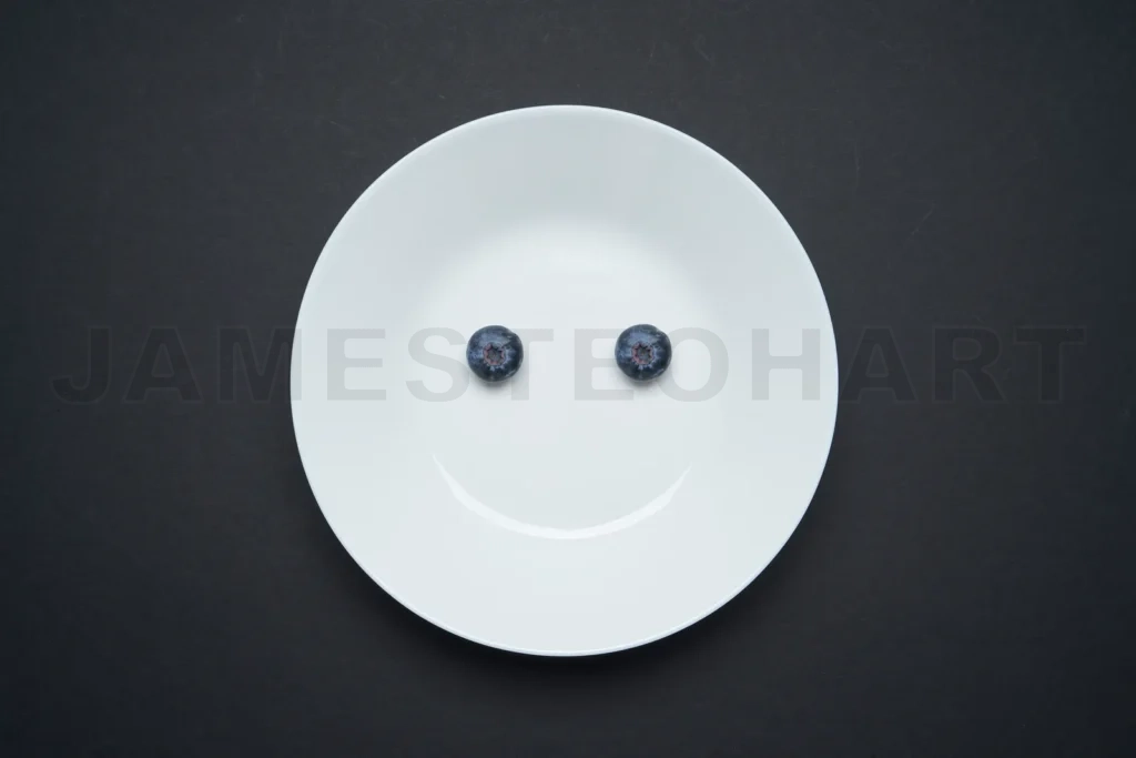 
Blueberries creating a happy face on white plate