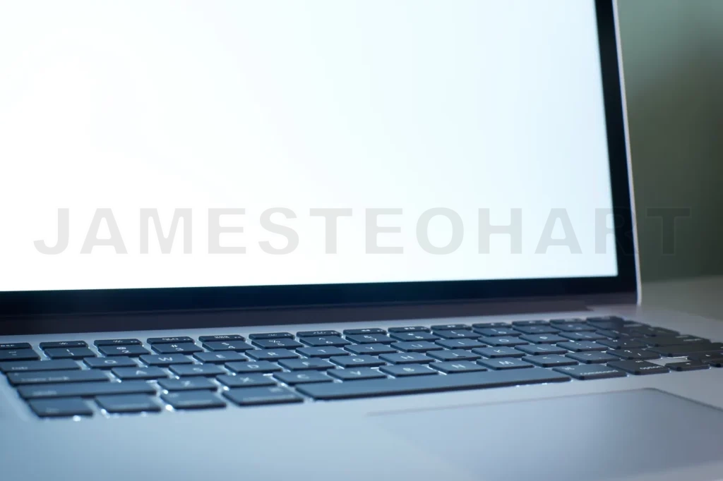 
Laptop Keyboard Close Up With White Copy Space Screen