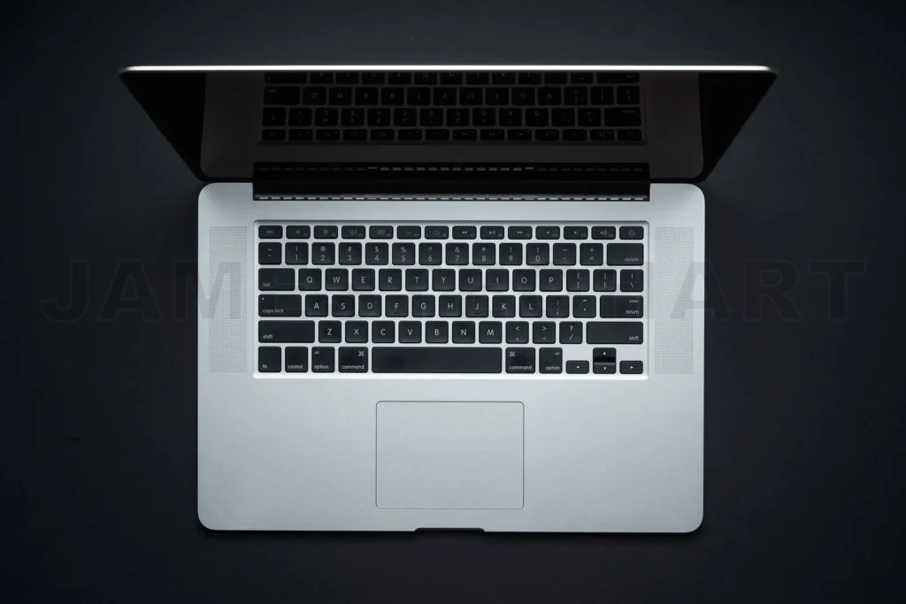 
Portable computer keyboard and screen on dark background