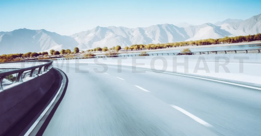 
Highway Overpass Motion Blur With Mountain Background