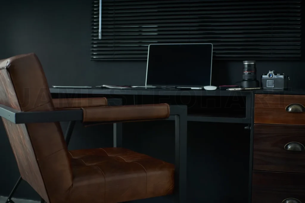 
Work Space On Black Table Of A Photographer Or Designer With Laptop , Retro Camera , Stylish Home Studio Concept Of Hipster