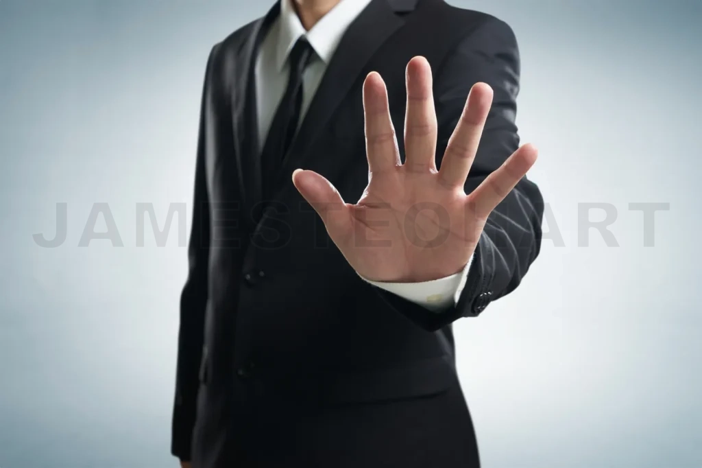 
Hand Stop Shown By Businessman