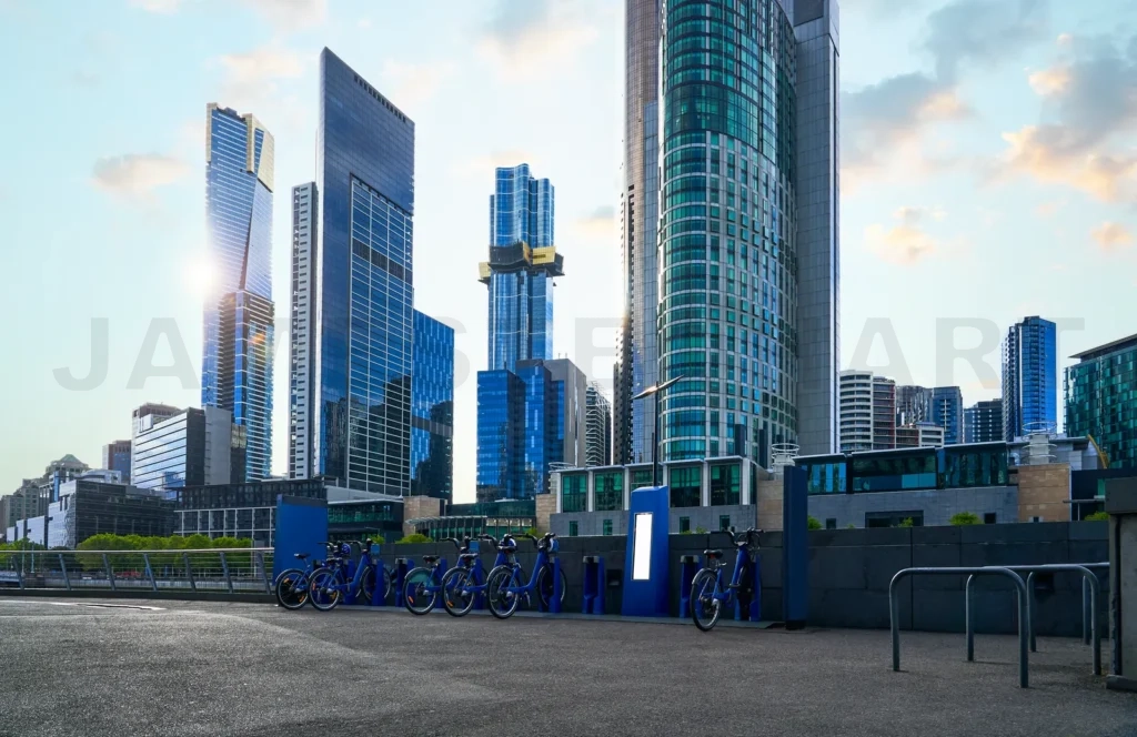 
Melbourne cityscape with modern buildings and bike sharing station