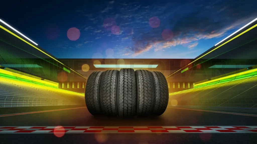 
Car Tires Pile On A International Race Track With Start And Finish Line, Evening Scene