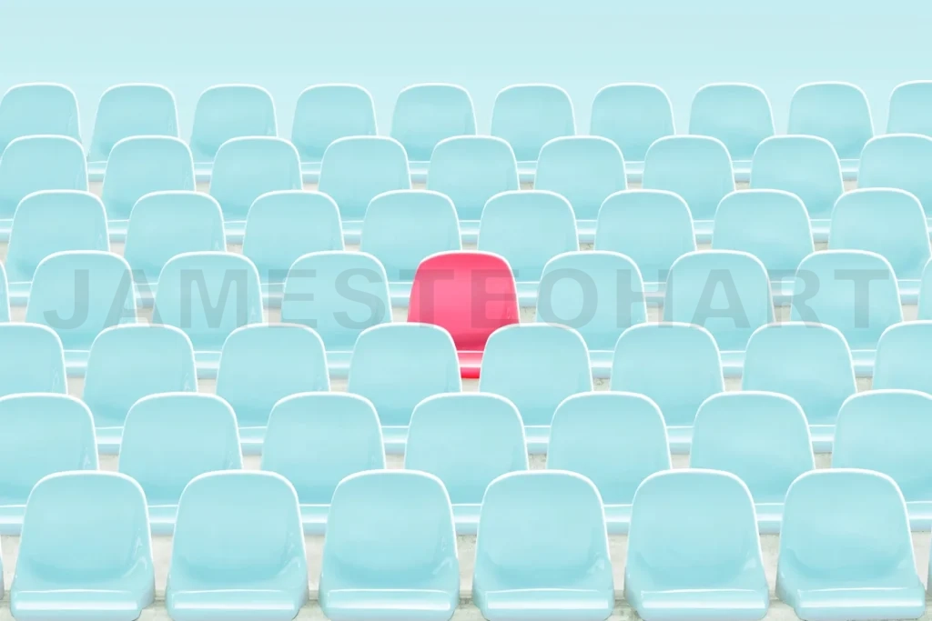
Pink chair standing out from blue crowd