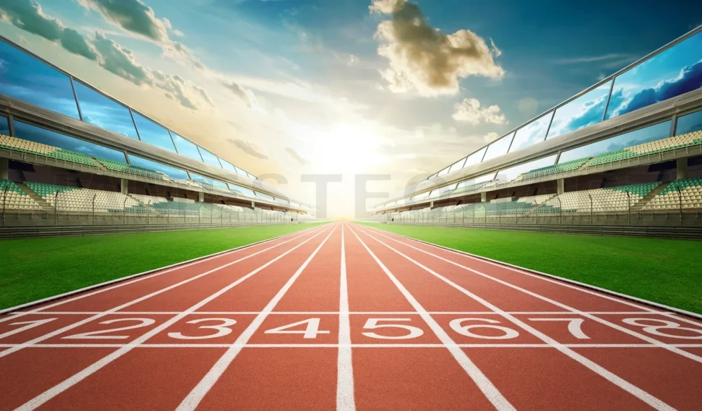 
Running track in empty stadium at sunset preparing competition