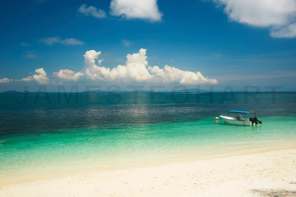 
Tropical beach with boat on turquoise water