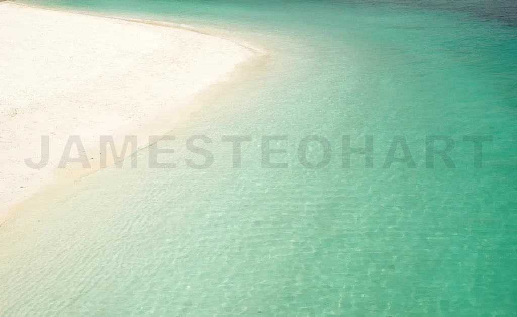 
Tropical white sand beach with clear turquoise water