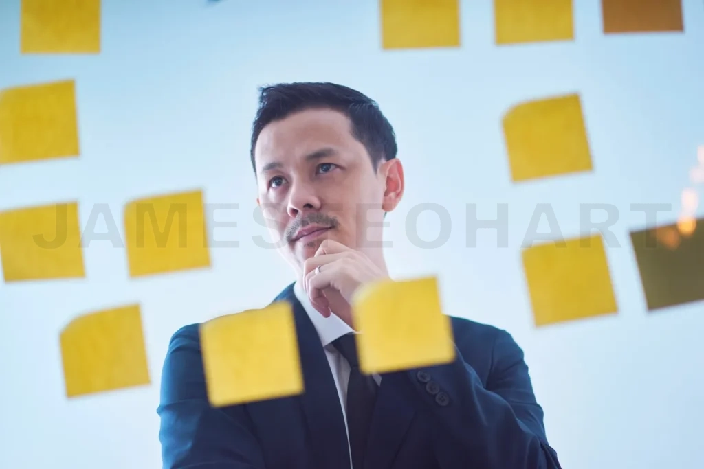 
Asian businessman thinking and planning new project strategy